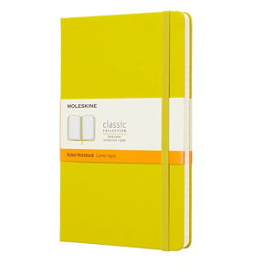 Žlutý linkovaný zápisník v pevné vazbě Moleskine, 192 stran